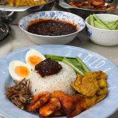 Nasi Lemak with Curry Chicken A picture of Nasi Lemak with Curry Chicken.