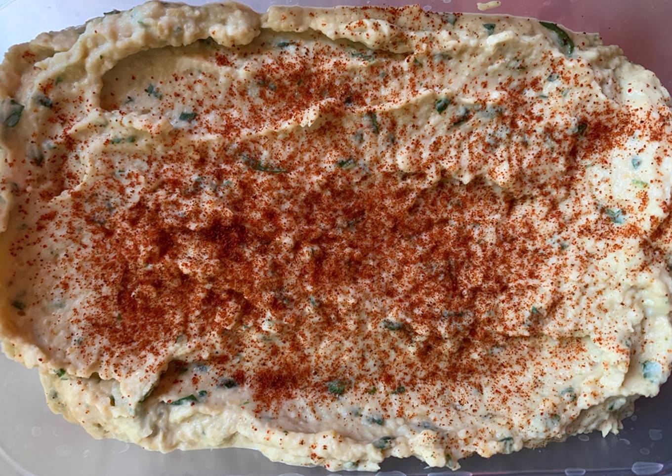 Hummus con rúcula