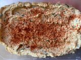 Hummus con rúcula