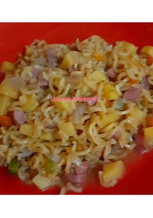 A picture of Noodles with Sausages.