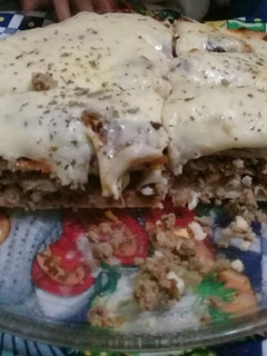 Una foto de Pizza RELLENA 🍭