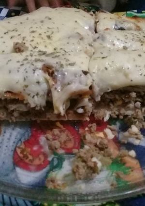 Una foto de Pizza RELLENA 🍭