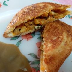 A picture of Toasted Sandwich made with Potato Sabzi.