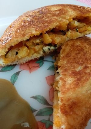 A picture of Toasted Sandwich made with Potato Sabzi.