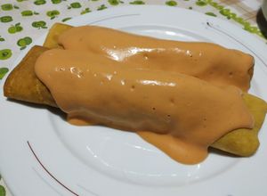 Una foto de Canelones con relleno de proteína de soja y masa de zanahoria