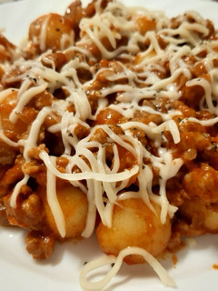 Una foto de Gnocchis a la boloñesa y queso