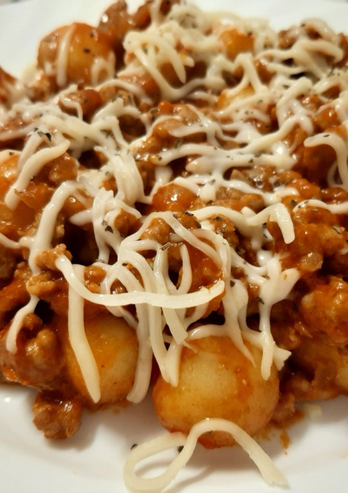 Una foto de Gnocchis a la boloñesa y queso