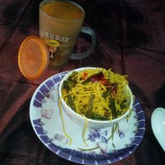 A picture of Chowmin biryani and chicken soup.