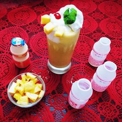 A picture of Virgin Yakult Pina Colada topped with Whipped Cream.