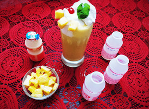A picture of Virgin Yakult Pina Colada topped with Whipped Cream.