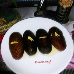 A picture of Bread gulab jamun.