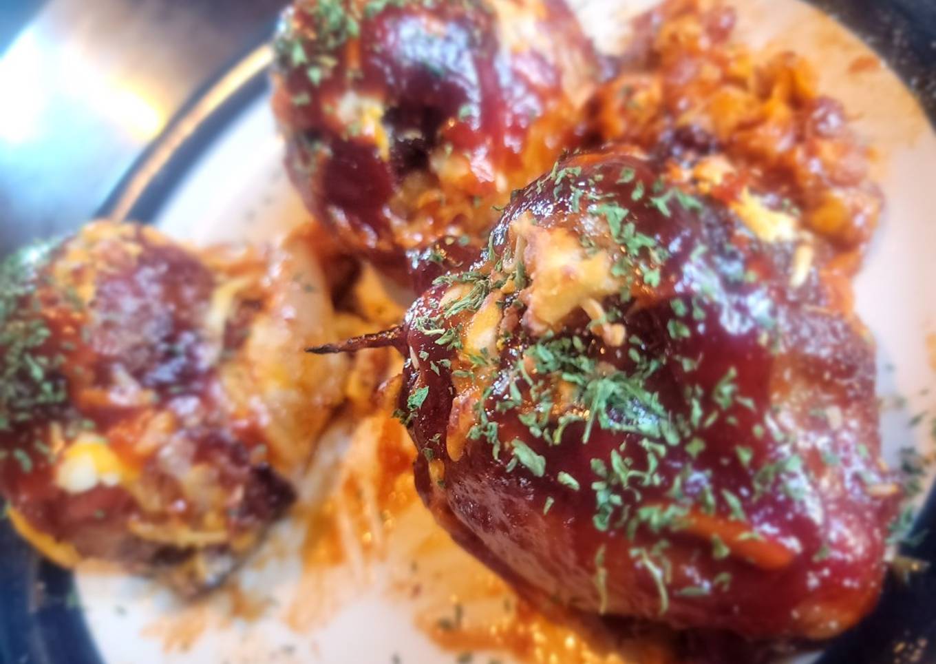 BBQ Bacon-Wrapped Burger-Stuffed Onion Bombs