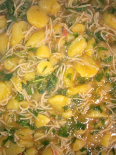 A picture of Jellof Spaghetti and potato.