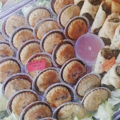 A picture of Spinach & cheese cup pies.
