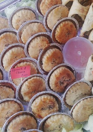 A picture of Spinach & cheese cup pies.