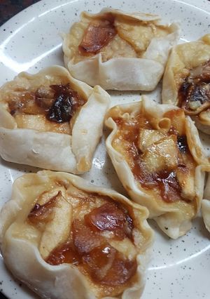 Una foto de Rollos de hojaldre con crema pastelera y manzanas caramelizadas
