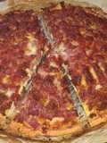 Pizza con base de pollo
