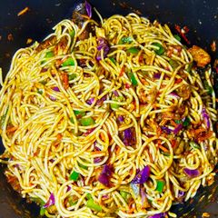 A picture of Jollof spaghetti.