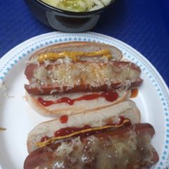A picture of Meaty Onionie Sauce, On Hotdogs.