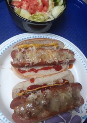 A picture of Meaty Onionie Sauce, On Hotdogs.