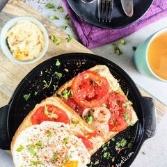 A picture of Hummus Shakshuka Toast.