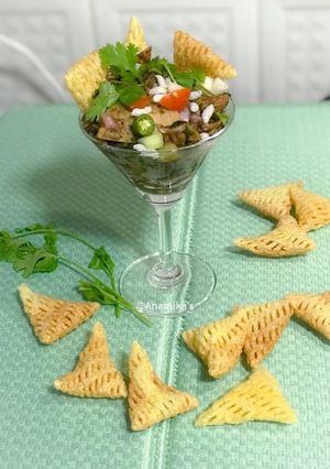 A picture of Crispy Nachos Papad Bhel Chat.