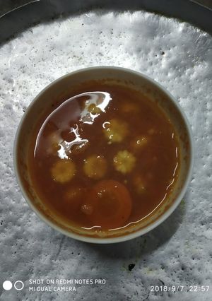 A picture of Tomato corn soup.