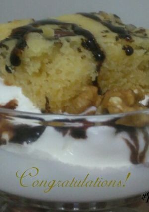 A picture of Vanilla Ice-cream with Walnut Mawa Cake.