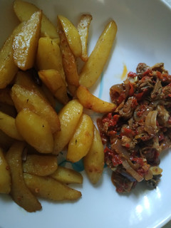 A picture of Chips and sauce.
