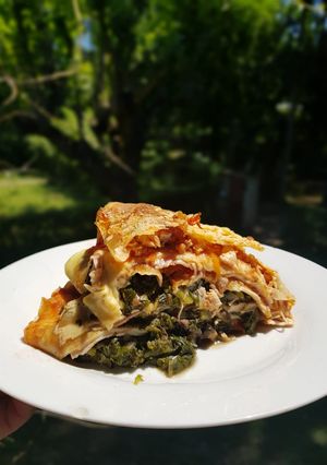 Una foto de Lasaña mixta (vegetariana y clásica)