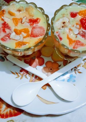 A picture of Delicious tasty Kesar mango watermelon papaya juciy fruit custard.