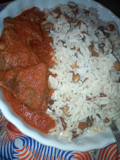 A picture of Rice and beans with beef stew.