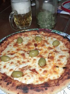 Una foto de Pizza a la napolitana