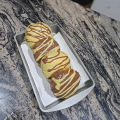 Chocolate Lemon glaze doughnuts A picture of Chocolate Lemon glaze doughnuts.
