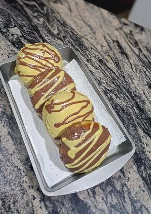 A picture of Chocolate Lemon glaze doughnuts.