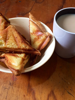 A picture of Toasted bread with bananas.