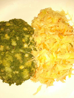 A picture of Mukimo served with cabbage.