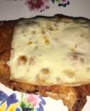 Milanesa de cerdo a la pizzagiola