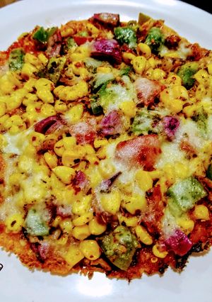 A picture of Sooji Veg Pizza.