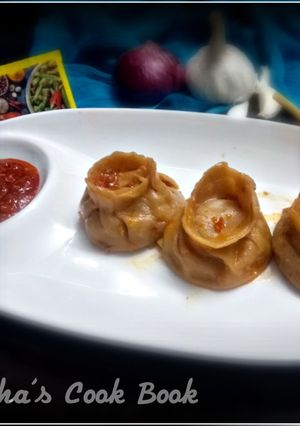 A picture of Steamed Momos with masala e magic.