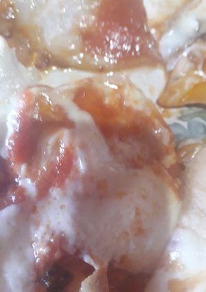Una foto de Bifes de pollo a la pizza con croquetas de acelga
