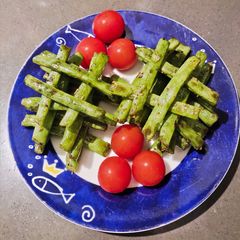 A picture of Sautéed Long Beans with Cherry Tomatoes.