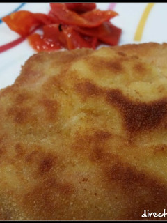 Una foto de San Jacobos de lomo con queso y pimientos