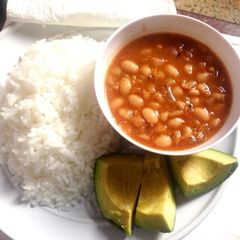 A picture of Yellow beans with boiled rice.