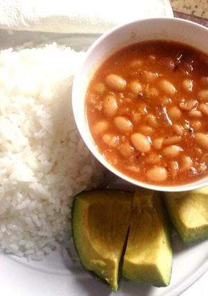 A picture of Yellow beans with boiled rice.