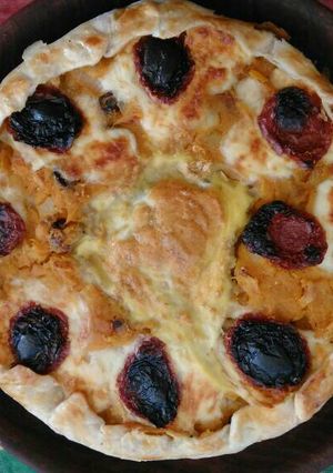 Una foto de Tarta de zapallo y tomates secos