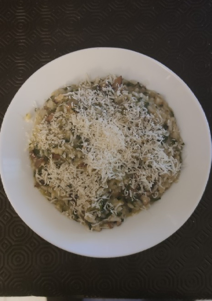 Una foto de Risotto acelgas, portobello y parmesano