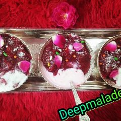 A picture of Beetroot Halwa wth icecream stuff.