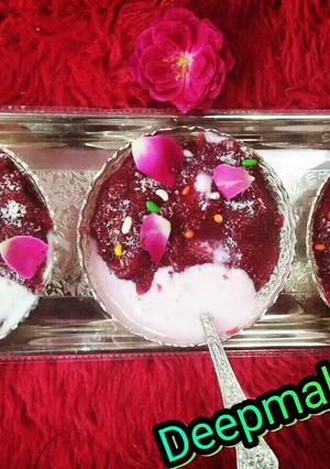 A picture of Beetroot Halwa wth icecream stuff.