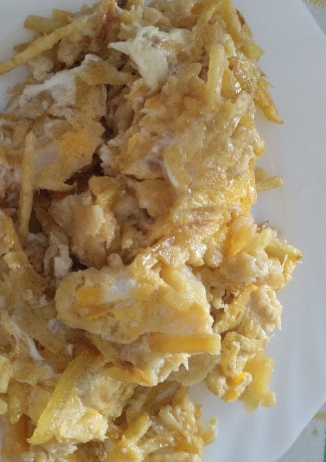 Una foto de Bacalao dorado con huevo